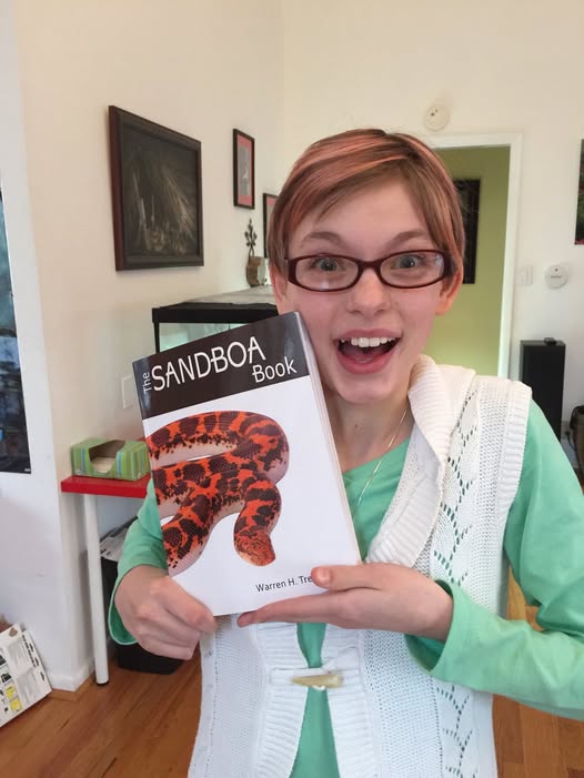 Happy customer with book